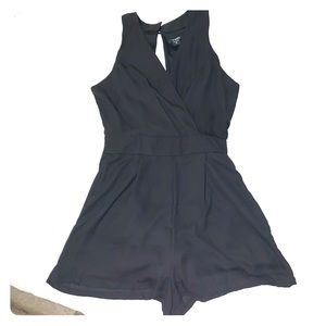 Classic Black Romper with open back details